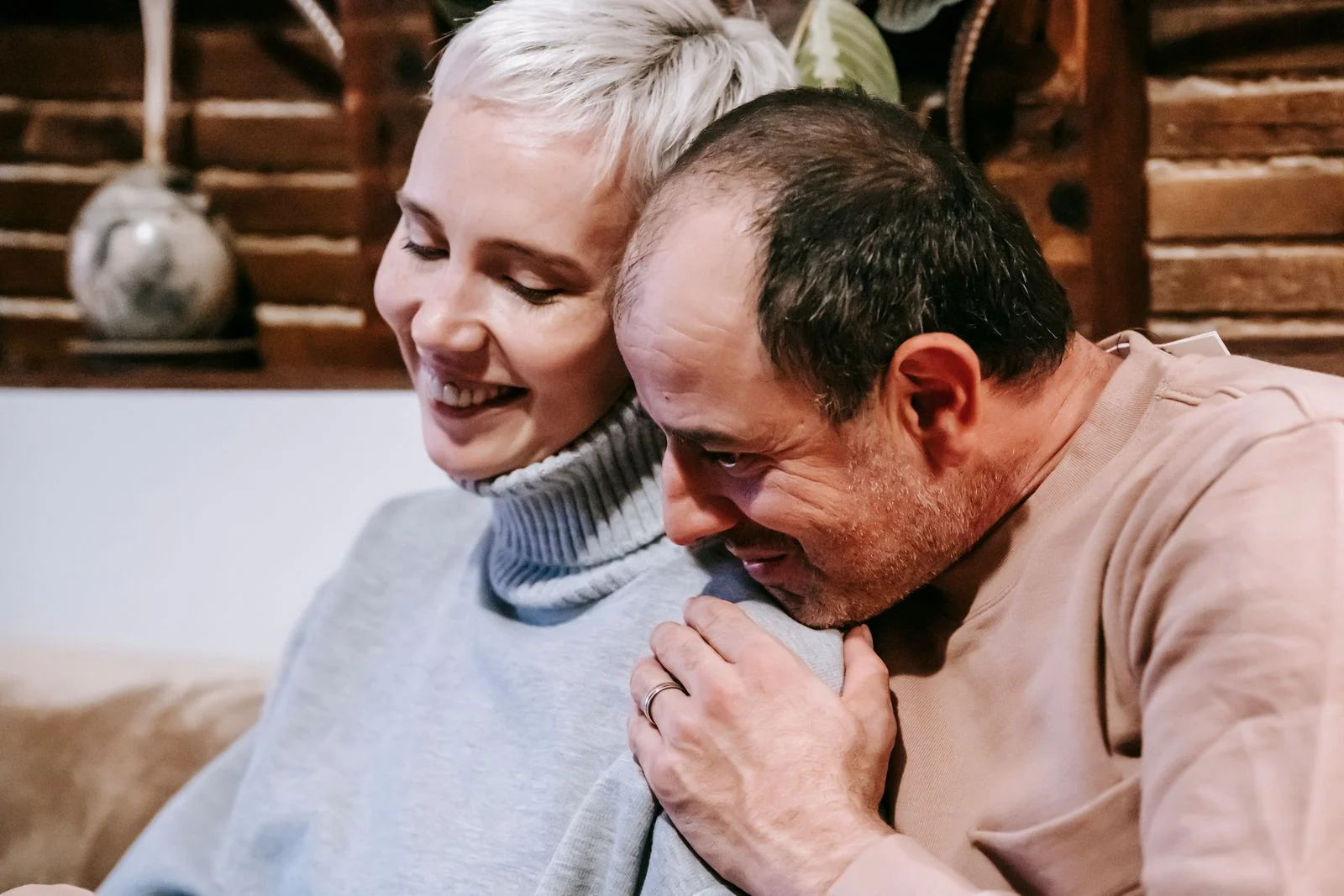 A couple sharing a quiet moment together at home